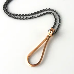 Pendant 18k gold on oxidised silver chain